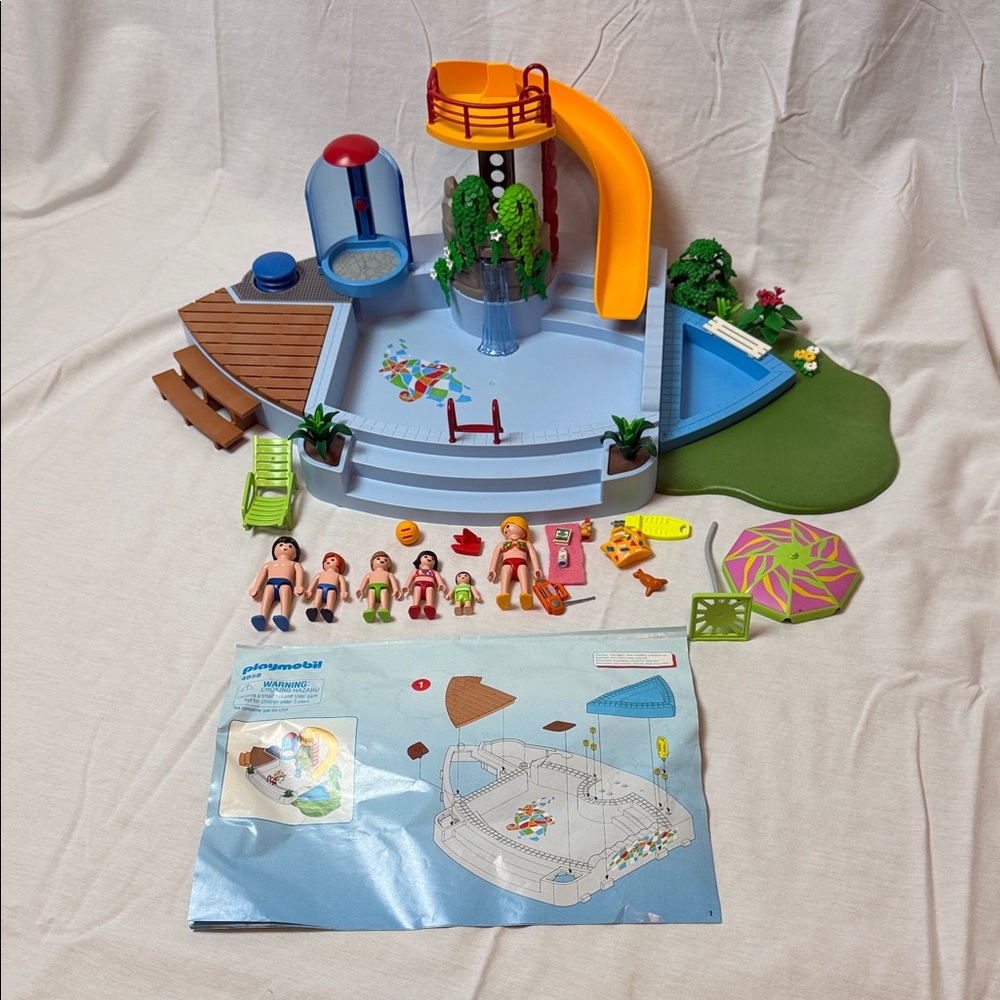 Playmobil 4858 Open Air Pool with Slide, family, and accessories